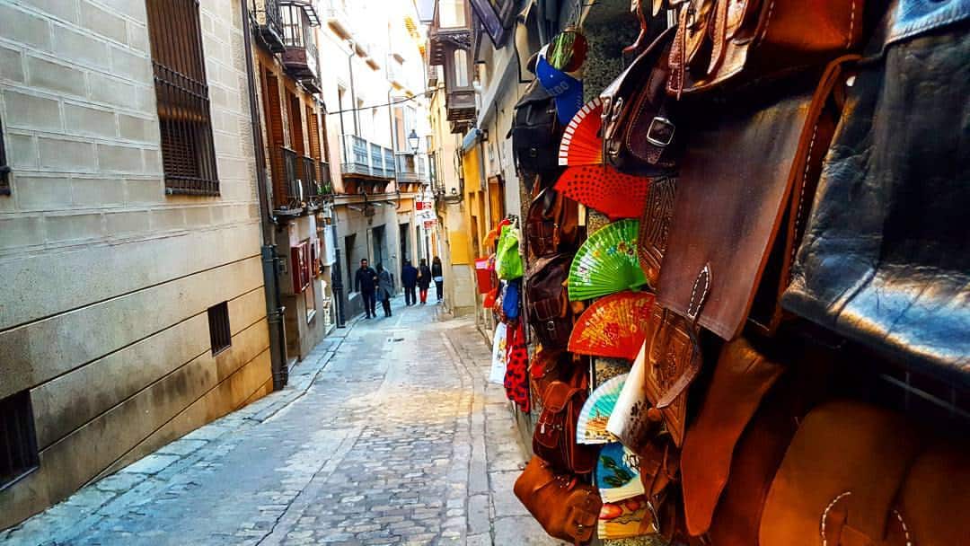Bags and souvenirs on the streets of Toledo Spain.