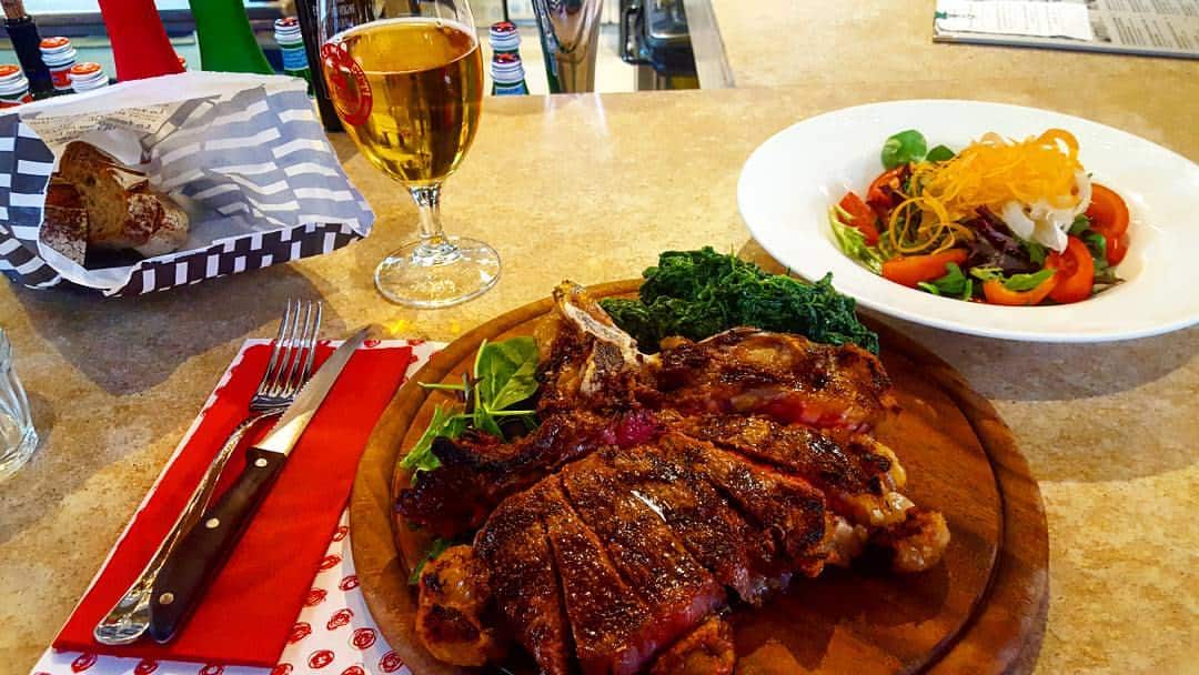 Eating the famous Fiorentina steak in Florence Italy