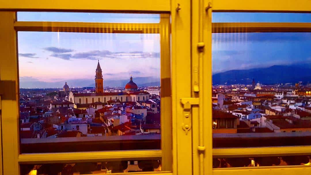Looking at Florence Italy from the place window in the evening
