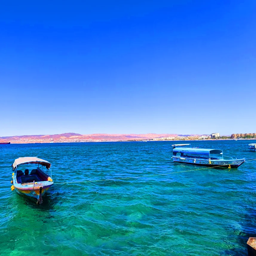 Aqaba is a Jordanian port city on the Red Sea's Gulf of Aqaba. boats