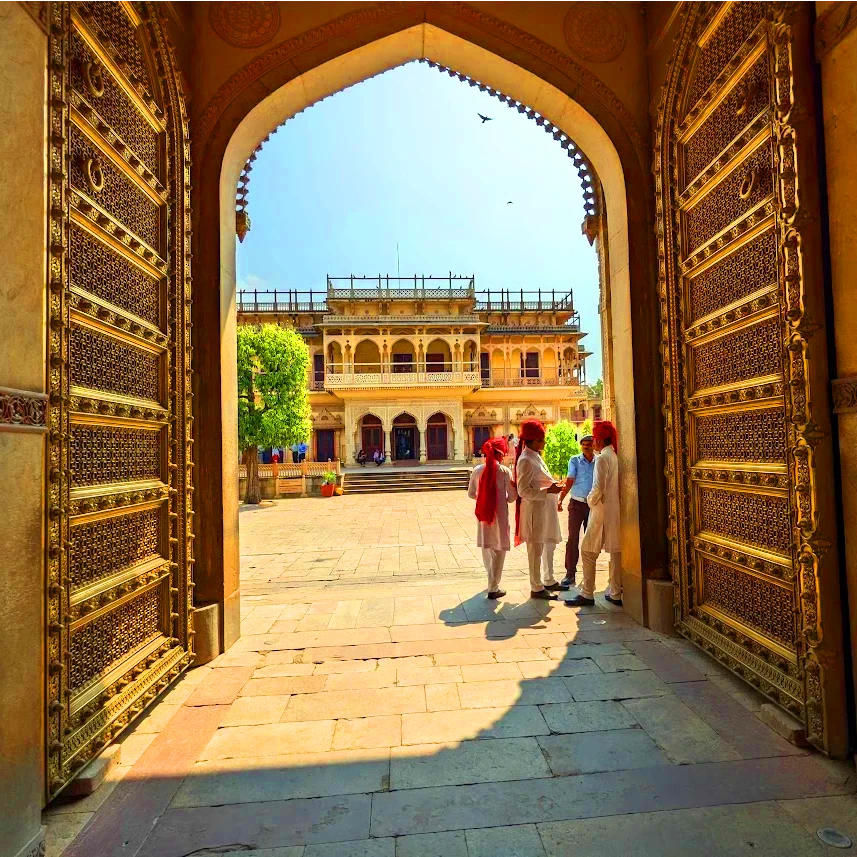 City Palace is a sprawling complex of palaces, gardens, and courtyards. It is the former residence of the Maharaja of Jaipur gold gate Jaipur India (1)