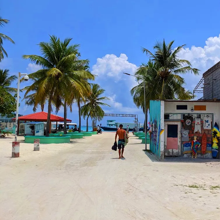 Maldives - Islands and surfer