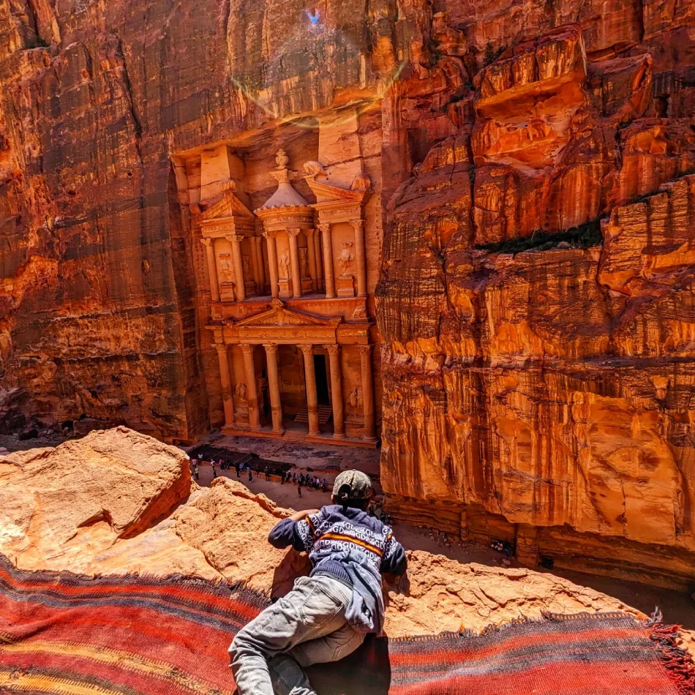 Petra, Jordan Where History, Mystery, and Adventure Unite, young boy on the edge