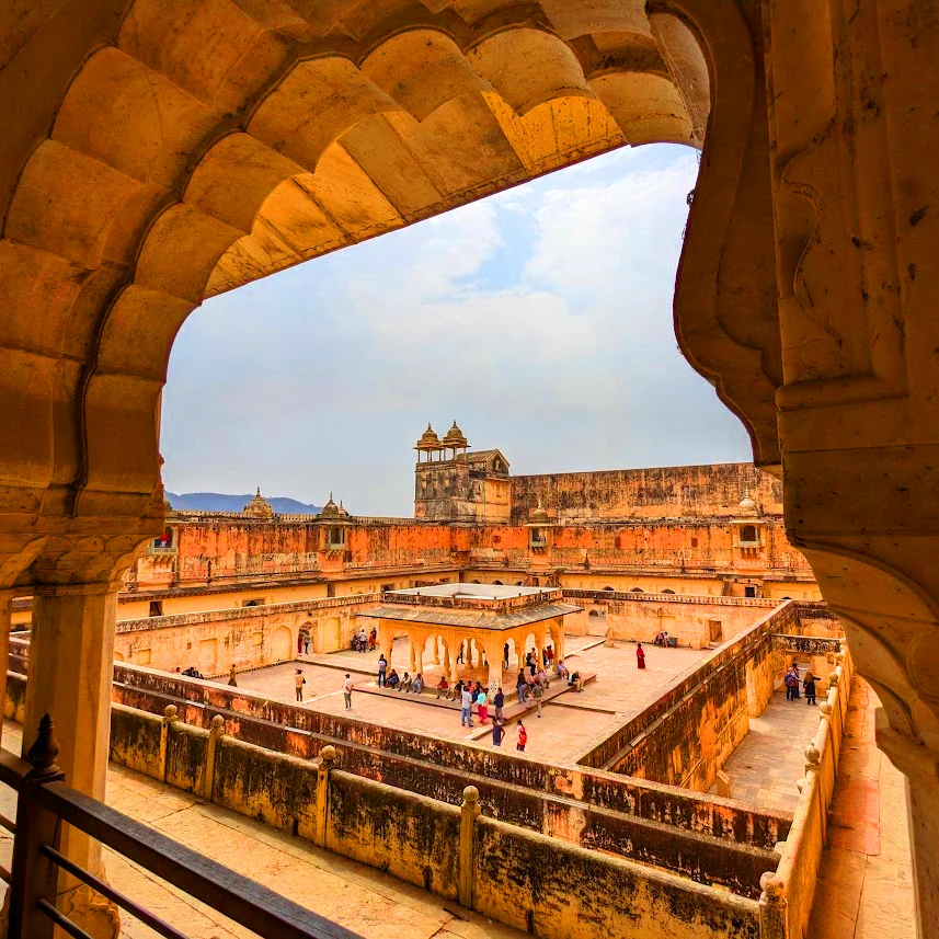 The Amber Fort is a magnificent palace complex located on a hilltop overlooking the city Jaipur India
