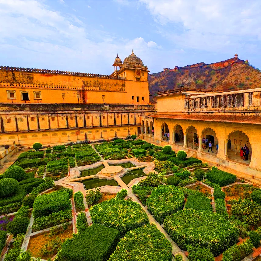 The Amber Fort is a magnificent palace complex located on a hilltop overlooking the city. It is one of the most popular tourist attractions in Jaipur India, Middle garden