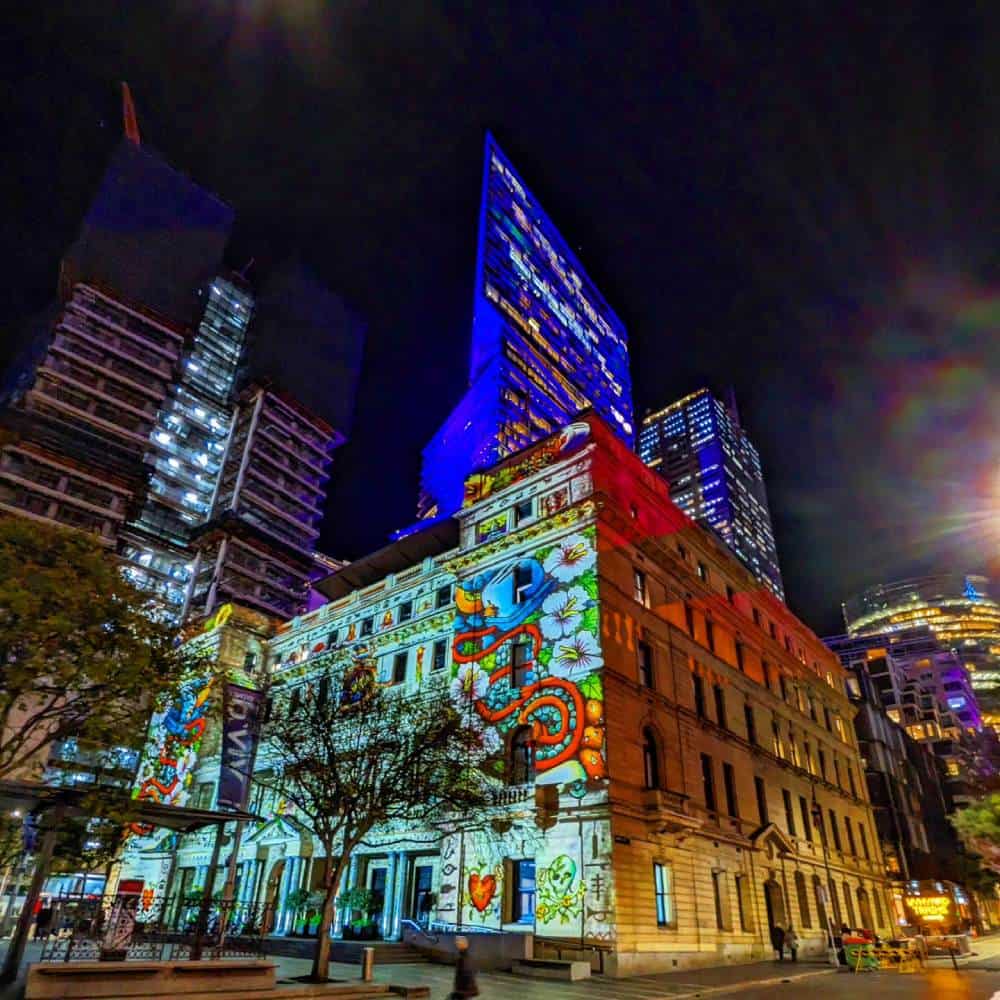 Sydney Australia building with lights on for vivid Sydney