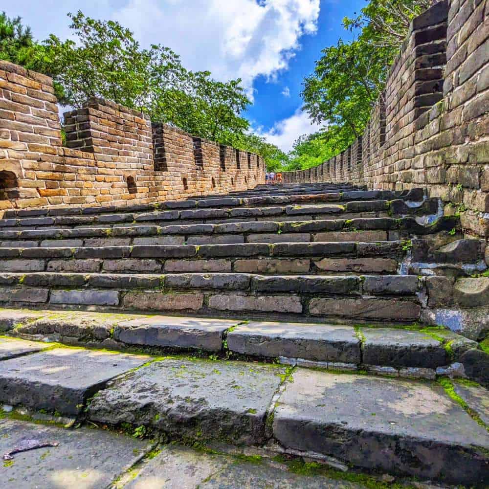 The primary purpose of the Great Wall was to protect the Chinese empire from invading forces big stairs