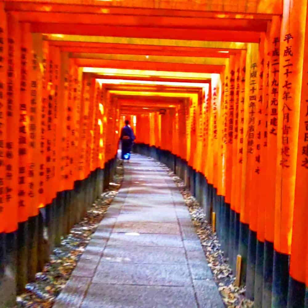 walkway with gust like person Fushimi Inari Taisha Kyoto, Japan - Things To Do And See